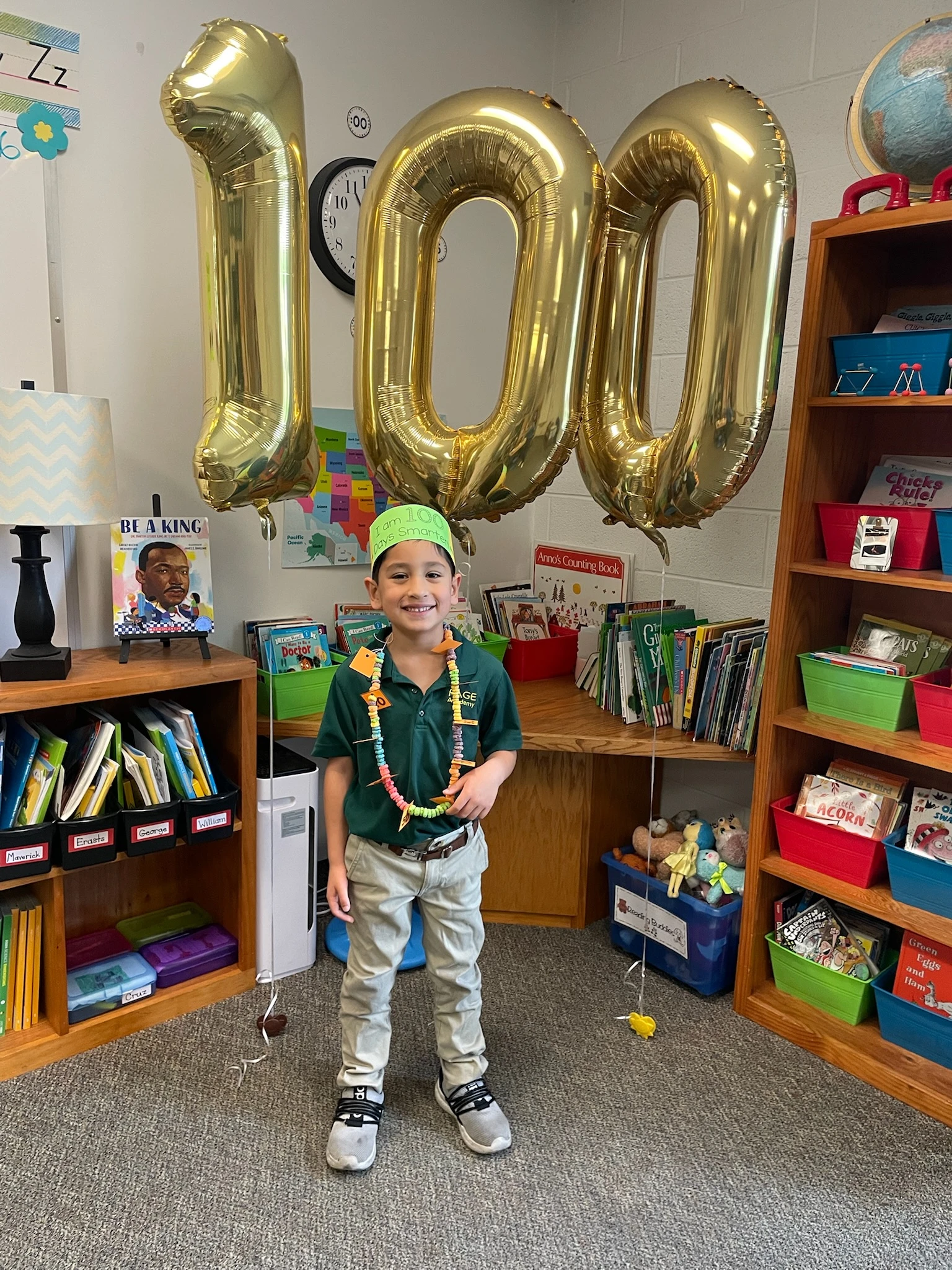 Page Academy student celebrating the 100th day of school in his classroom