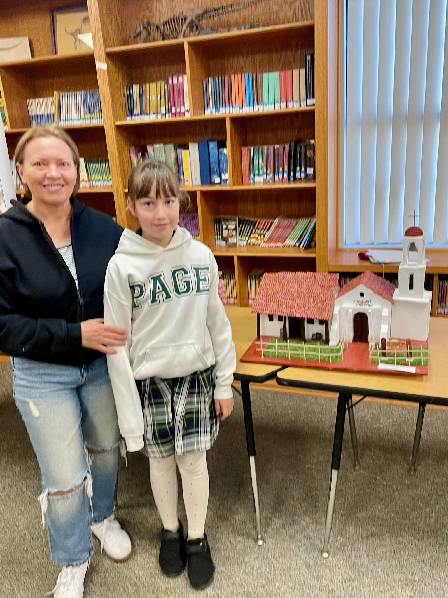 Page Academy student and parent with a California mission model