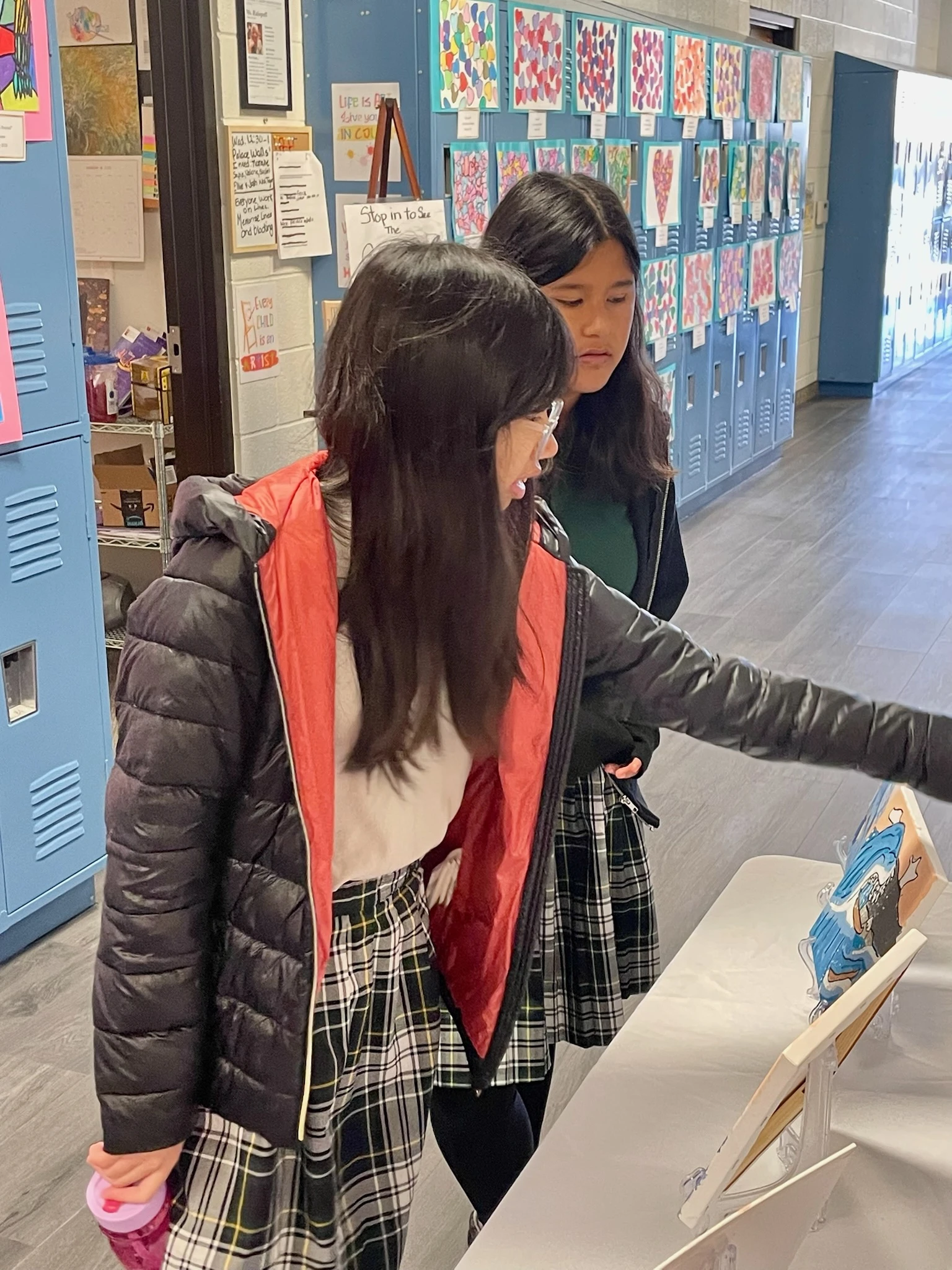 Two Page Academy students presenting a project