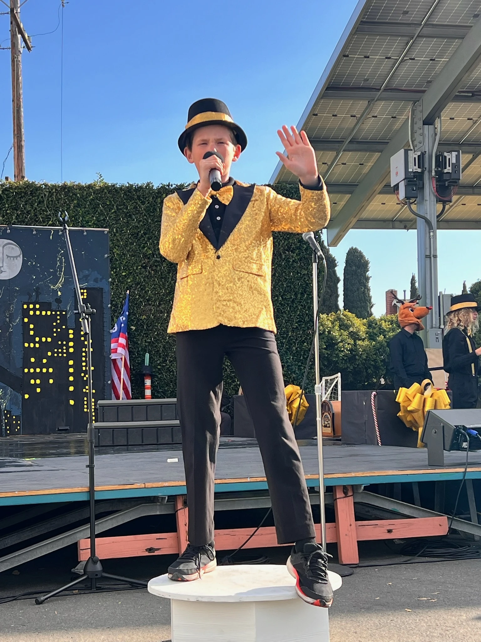 Page Academy student performing on the outdoor stage